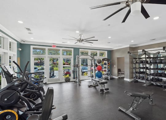 Community Fitness Center with Equipment at Fountains Lee Vista Apartments in Orlando, FL.