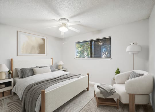 Model Bedroom with Carpet and Window View at Westland Park Apartments in Jacksonville, FL.