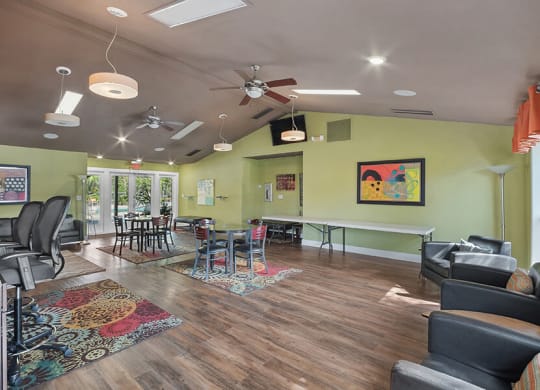 Community Clubhouse with Lounge Furniture at Fountains Lee Vista Apartments in Orlando, FL.