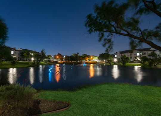 Community Pond and Landscape at Essence North Dallas Apartments located in Dallas, TX.