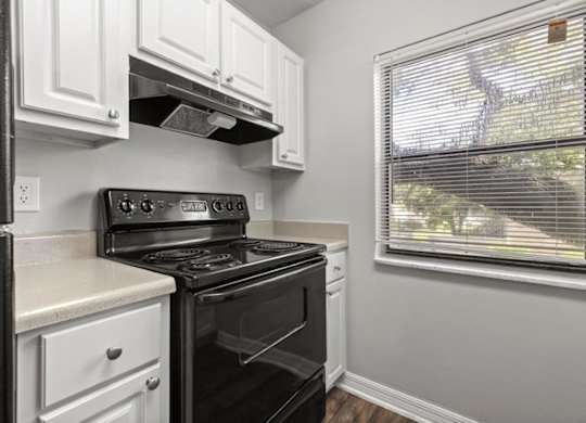 Model kitchen at Oasis at Bayside Apartments in Largo, FL