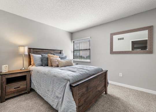 Model bedroom at Oasis at Bayside Apartments in Largo, FL