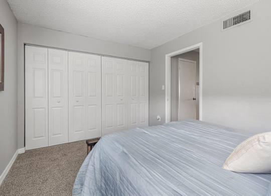 Model bedroom at Oasis at Bayside Apartments in Largo, FL