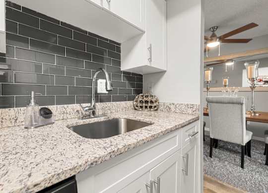 Model kitchen at Oasis at Bayside Apartments in Largo, FL