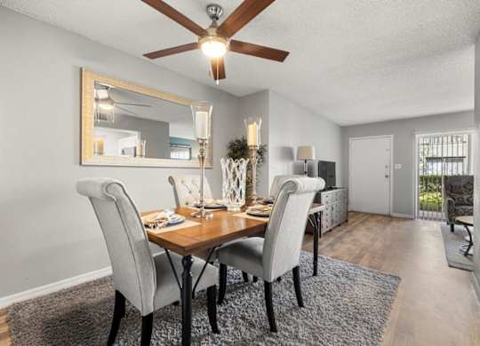 Model dining room at Oasis at Bayside Apartments in Largo, FL