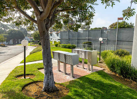 Exterior Community Building and Mailboxes at Santa Fe Ranch Apartments located in Carlsbad, CA.