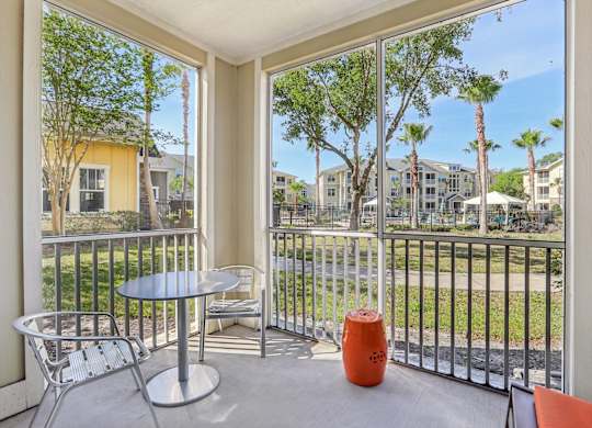 Model balcony with patio furniture.