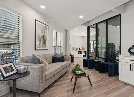 Community Clubhouse with Lounge Furniture at Arbor Village Apartments located in Charlotte, NC.