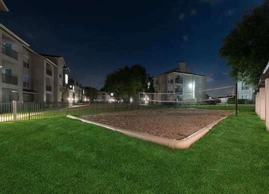 Outdoor Sand Volleyball Court at Essence North Dallas Apartments located in Dallas, TX.