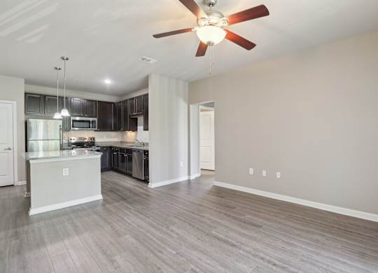 Model kitchen with a fan on the ceiling.