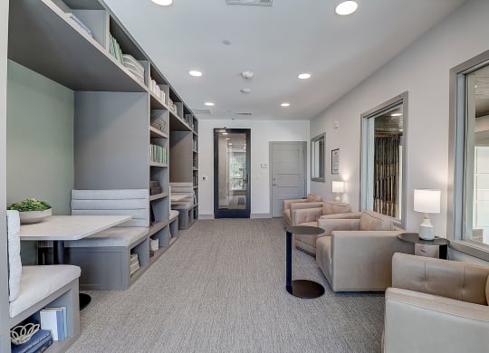 a room filled with furniture and a large window