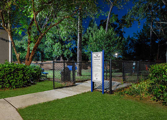 Community Dog Park with Agility Equipment at Arbors at Orange Park Apartments located in Orange Park, FL.