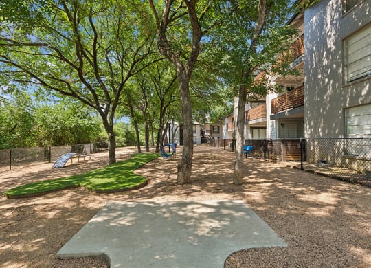 Community Dog Park with Agility Equipment at Woodcreek Apartments located in Arlington, TX.