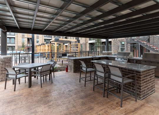 BBQ and picnic area at Alta 3Eighty Apartments in Aubrey, TX