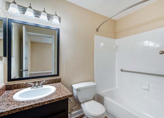 Model bathroom with white vanity at Bridges at Bayside in St. Petersburg, Florida.