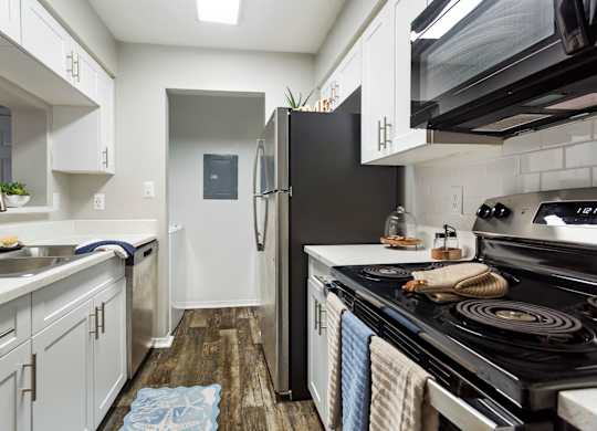 Model kitchen at Caribbean Breeze Apartments in Tampa, FL.