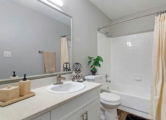 Model bathroom at Caribbean Breeze Apartments in Tampa, FL.
