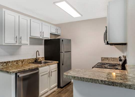 Model kitchen with modern appliances at Park at 7200 in Jacksonville, Florida.