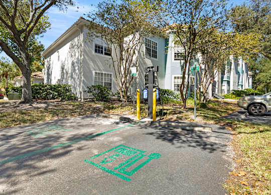 Community building and parking lot at Vinings at Hunters Green in Tampa, Florida.