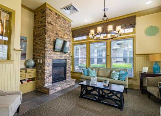 Leasing office lounge with fireplace at Bridges at Crosstown in Tampa, FL
