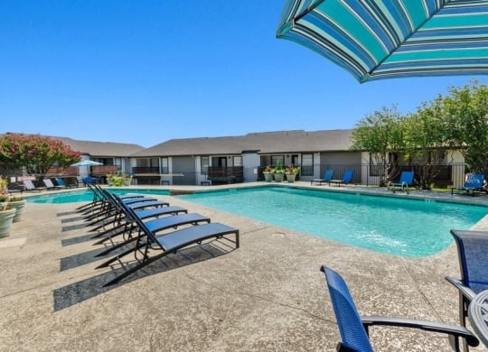 Resort style swimming pool with sundeck