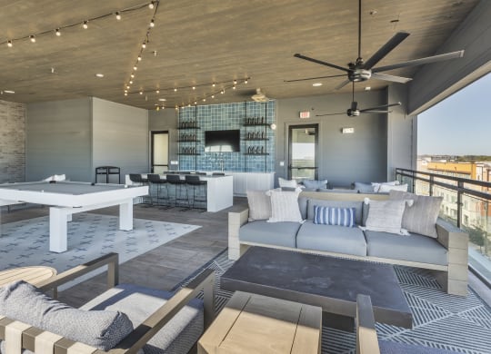 a living room with couches and a table