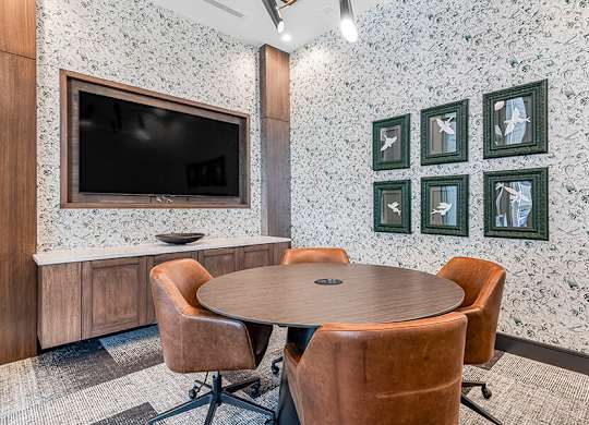 Community Clubhouse Meeting Room at Ovation at Galatyn Park Apartments located in Richardson, TX.