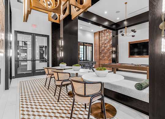 Community Clubhouse at Ovation at Galatyn Park Apartments located in Richardson, TX.