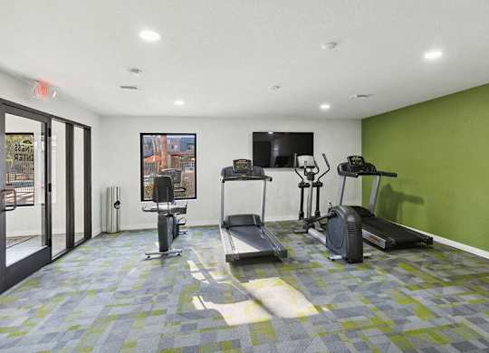 Community Fitness Center with Equipment at Tanque Verde Apartments located in Tucson, AZ.
