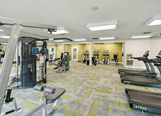 Community Fitness Center with Equipment at The Club Apartments located in Hillsboro, OR.