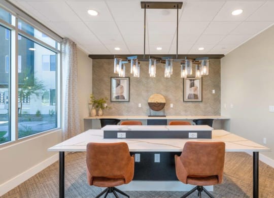 Business center workstations at Glen 91 Apartments in Glendale, AZ