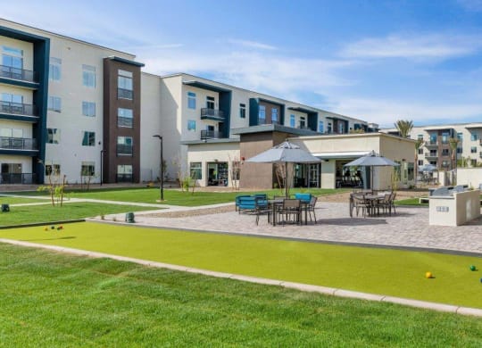 Outdoor patio lounge at Glen 91 Apartments in Glendale, AZ