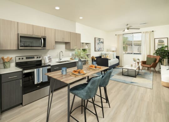 a kitchen and living room in a 555 waverly unit