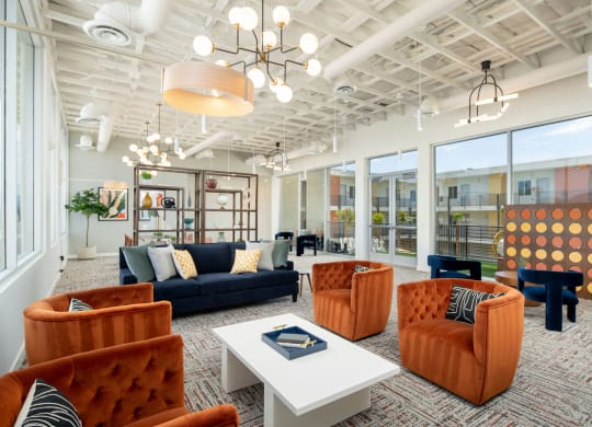 a room filled with furniture and a large window