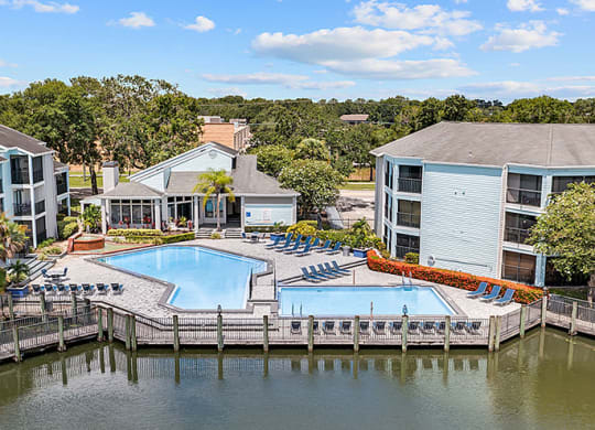 View from the lake of the pools and the apartments