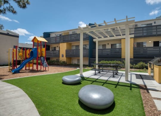 Picnic area and playground at Horizon Apartments in Santa Ana, California