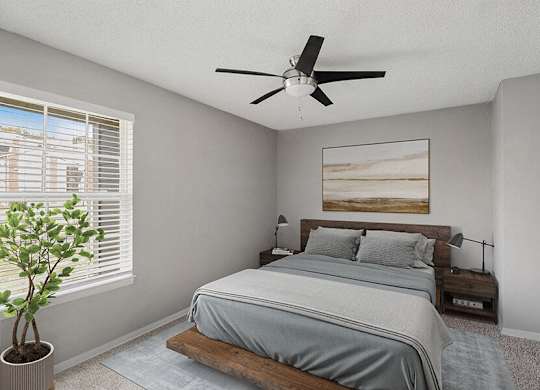 Model Bedroom with Carpet and Window View at Abbington Heights Apartments in Antioch, TN.