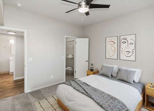 Model bedroom with walk-in closet