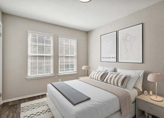 a bedroom with a bed and three windows