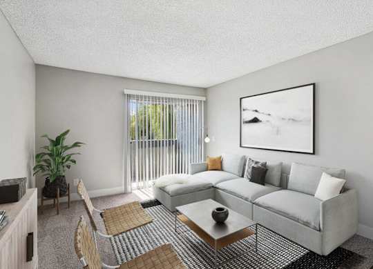 a living room with a couch and a coffee table
