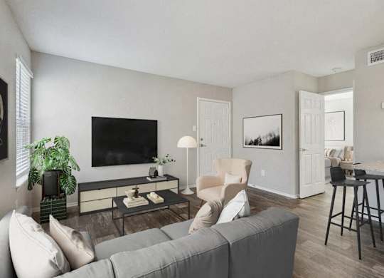 a living room with a couch and a television