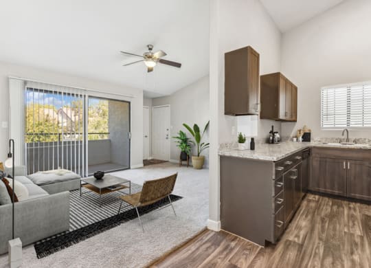 Model apartment kitchen and living room at Lore South Mountain, Phoenix, AZ