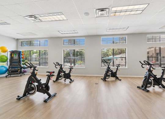 Fitness center with stationary bikes at Mirage on Kernan Apartments in Jacksonville, FL