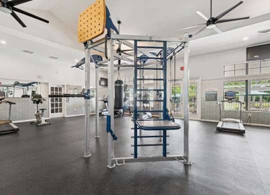 Fitness center with weightlifting equipment at Mirage on Kernan Apartments in Jacksonville, FL