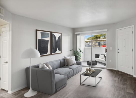 a living room with a couch and a table