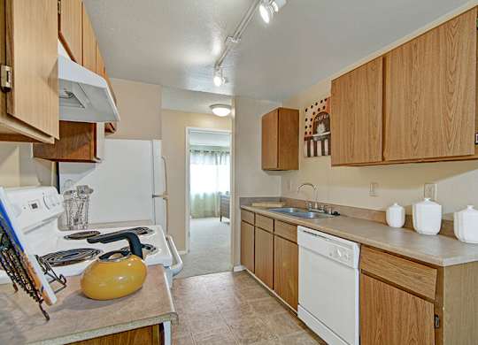 Model Kitchen at Ridge & Shores Apartments located in Federal Way, WA.