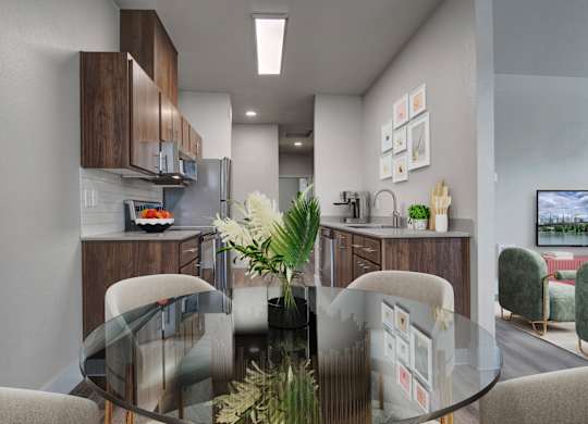 A modern kitchen with a glass table and chairs.
