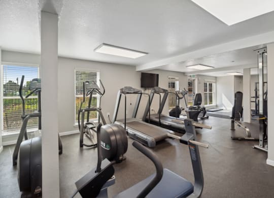 fitness center with exercise equipment