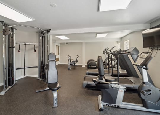 fitness center with exercise equipment