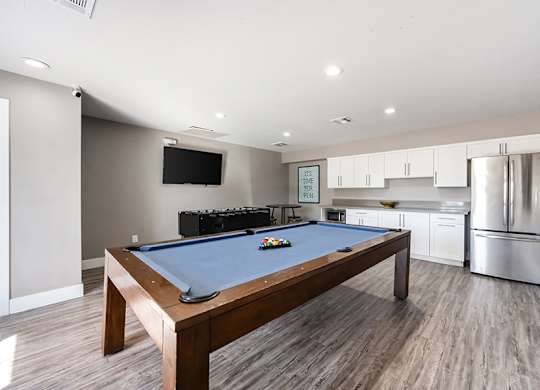 Community Game Room at Bridges at Tropicana Apartments located in Las Vegas, Nevada.